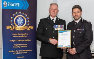 Zach Printer (left) receives a commendation from Devon &Cornwall Police Acting Chief Constable Jim Colwell
