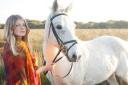 Chloe Rideout with her beloved horse Spenser