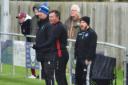 Helston Athletic manager Steve Massey (centre) has been in charge of the Blues since 2017