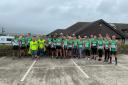 Hayle Runners pose for a team photo before the Marazion 10K