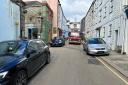 The pictrue Falmouth Fire Station posted of the cars blocking the route for their vehicle