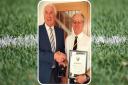 Bruce Taylor (left) is presented with his gold medal by Cornwall County FA director Steve Carpenter