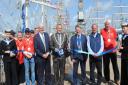 Mayor John Body cuts the ribbon to official open the Falmouth Tall Ships Regatta