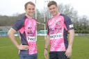 Tom Kessell and Matt Evans show off the pink kits the Pirates will be wearing on Sunday. Picture: SIMON BRYANT/ITKIS PHOTO