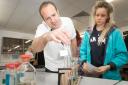 Chemistry lecturer Chris Hutton with Katie Hughes on her visit to the Truro College Open Day. (57573715)