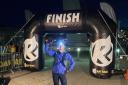 Lesly Heather at the finish line after completing 'The Wall' marathon