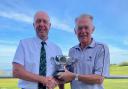 Club Captain Nick Chinn (left) presenting David “Dickie” Dickinson with the Falmouth Hotel Bowl