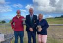 Club Captain Nick Chinn flanked by Brian and Donna Craig who won the Royal Duchy Bowls on Sunday.