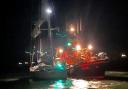 The Penlee Lifeboat arrives safely back to Newlyn with the yacht