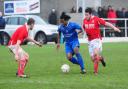 Older brother Hedie Santos in action against Bude Town. Picture: PHIL RUBERRY