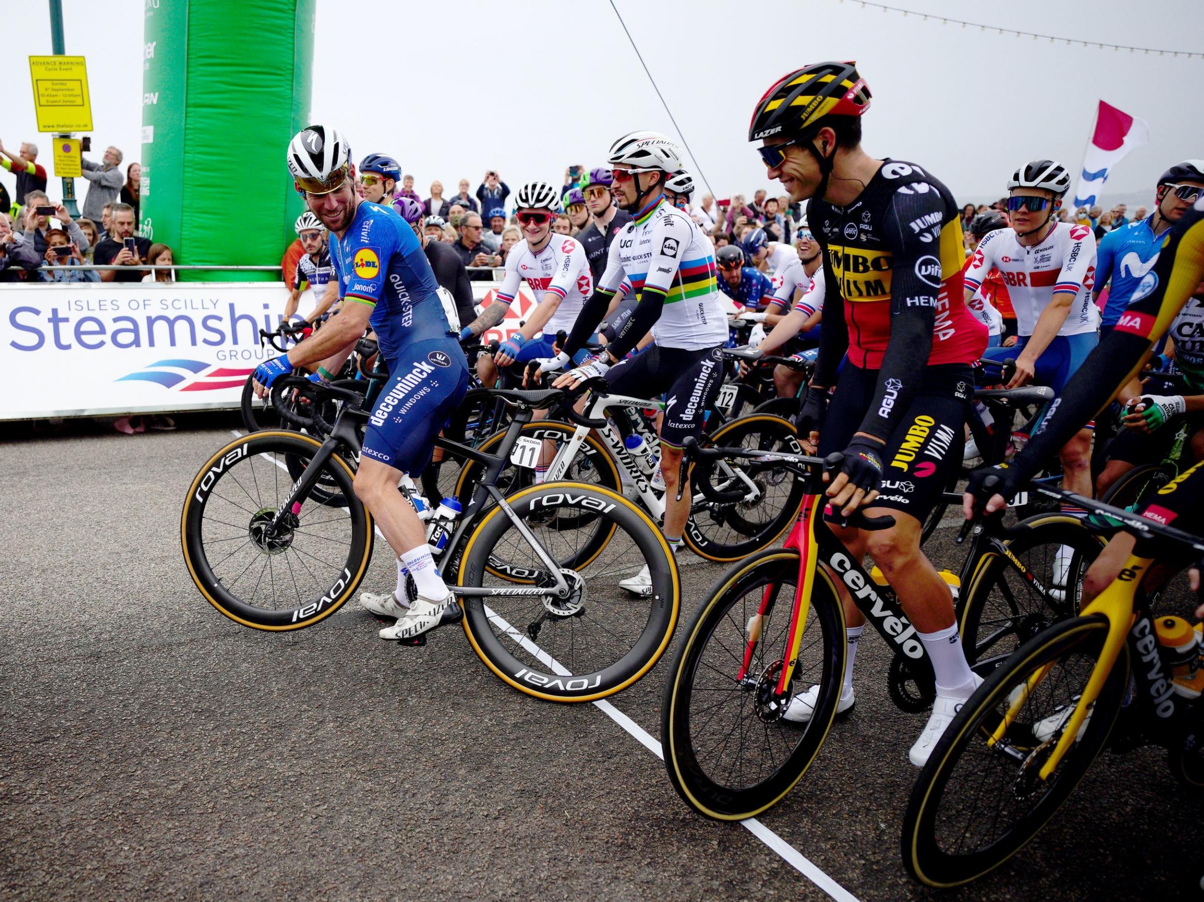 Mark Cavendish (left) on the start one of stage one in Penzance Picture: Ben Birchall/PA Wire