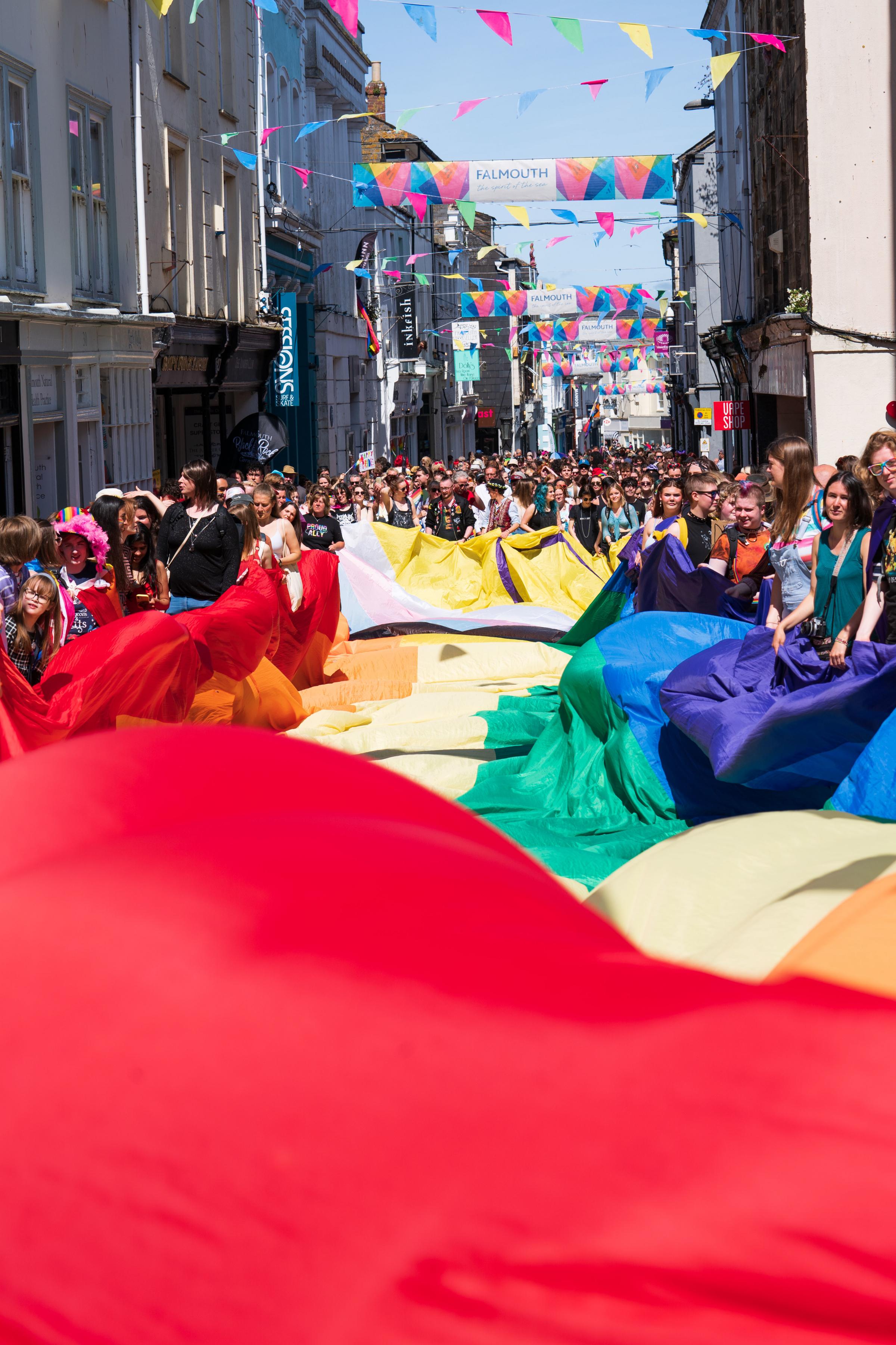 The first Pride march of the month, kicking off in Falmouth with the worlds largest Pride march flag. The march started at the Prince of Wales Pier, went through the centre of town and ended at Events Square. Picture Ollietphotography