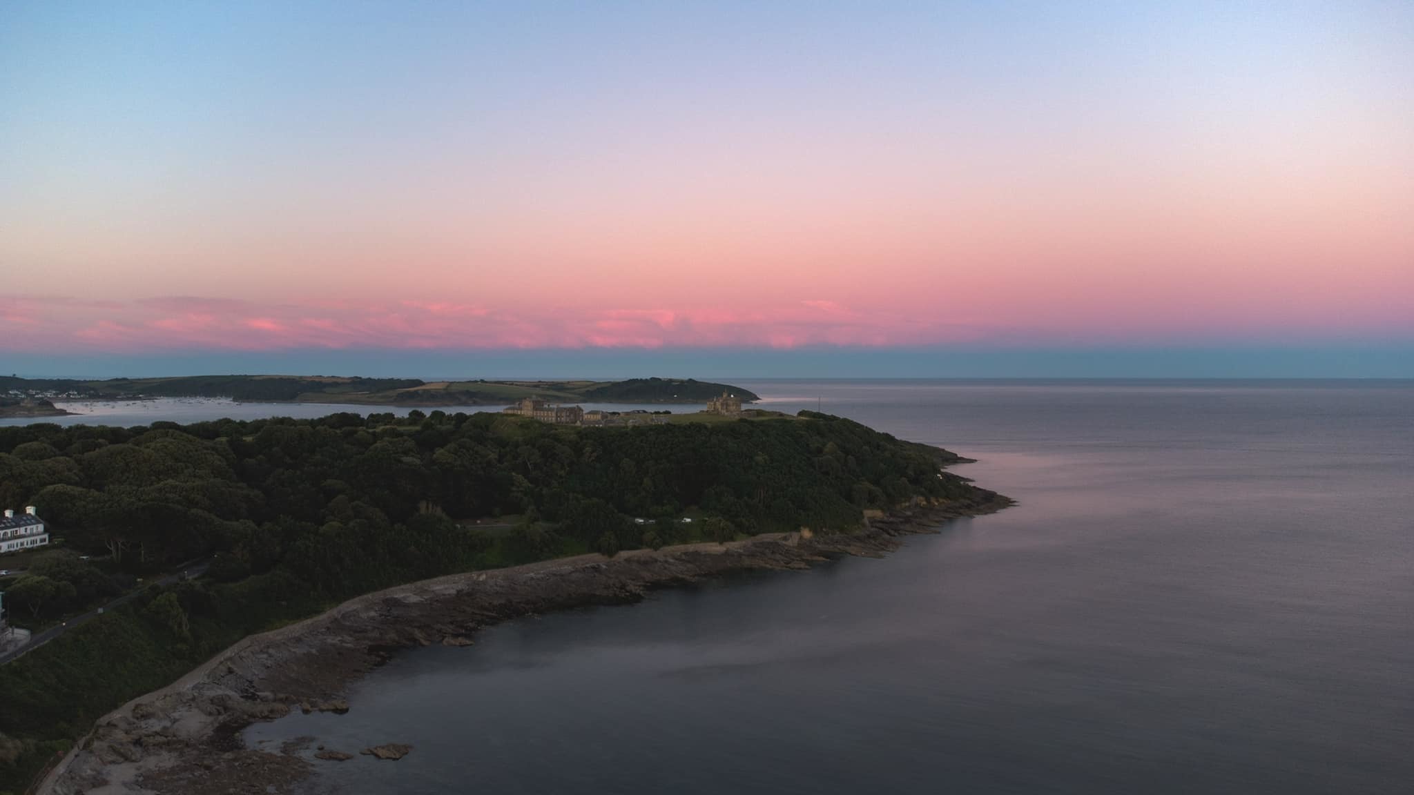 Dan West uses his drone over the sea at Falmouth, as the sun sets on another Cornish day.