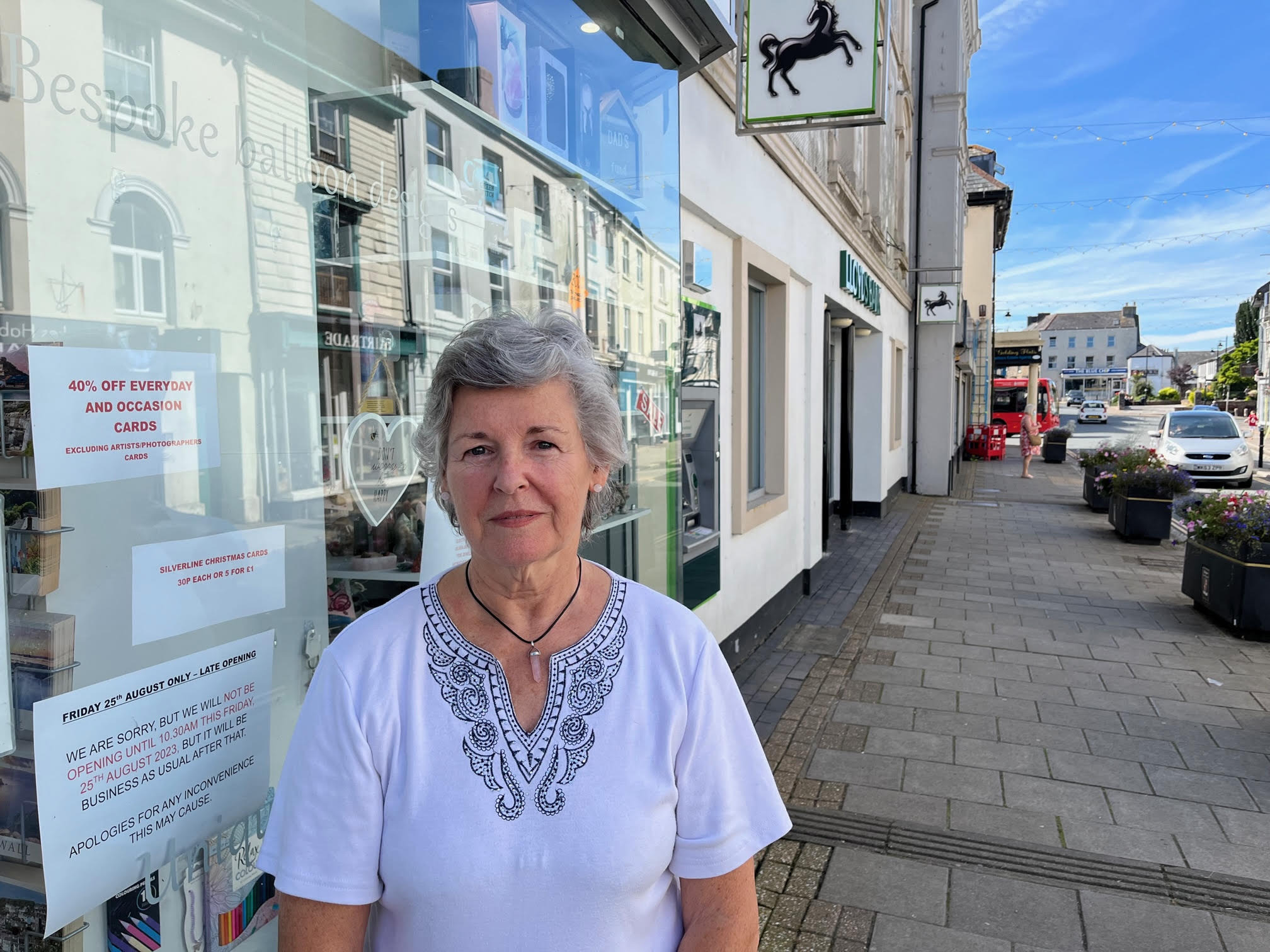 Tricia Stephenson outside her Victoria Eyton shop, which she is closing in September as a direct result of the car parking increases. Lloyds Bank, next door, is also closing (Pic: Lee Trewhela / LDRS)