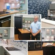 Bradfords Building Supplies manager Pete Slinn (centre) with some of the kitchens in the new showroom