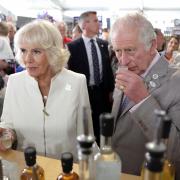 The Prince of Wales and the Duchess of Cornwall meet with exhibitors during a visit to the Royal Cornwall Show. Picture: PA