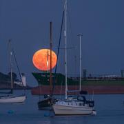 This ship seems to be leaving Falmouth with the Full moon balancing on its bow, by Stuart Wilkes