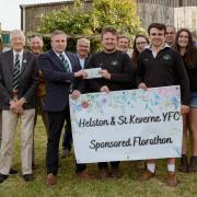 Members of Helston and St Keverne Young Farmers Club with Flora Day Association representatives