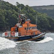 Photos of Fowey lifeboat setting off on the first shout