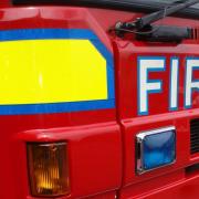 Investigation launched after fire in block of flats in town centre