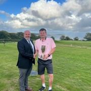 Falmouth Golf Club Captain Pete Lewis (left) presenting Ian Moore with the Bearne Cup. Picture: Keith Rashleigh