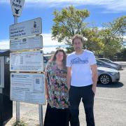 Vicki and Andy Brett, who run Dogsbodies pet shop, in the New Road South car park (Pic: Lee Trewhela / LDRS)