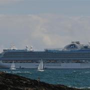 n Cruise ship Emerald Princess anchored off Pendennis Point  				 Image: Jon Bennett