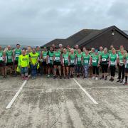 Hayle Runners pose for a team photo before the Marazion 10K