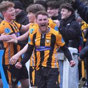 Luke Barner celebrates the win for Falmouth Town