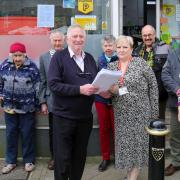 MP Derek Thomas, Post Office area manager Cathryn Gee, residents David Walis and Mrs Greenwood-Penny, mayor William Collins, town councillor Penney Hosking, Cornwall councillor John Martin and Marazion business owner Julia Greig