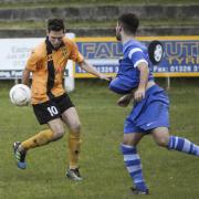 Glen Squires on the ball for Falmouth Town in Saturday's match with Torpoint Athletic. Picture: DANNI HERON/CARTEL