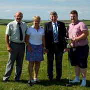 From left at Mullion Golf Club is President Ben Willey, Margaret Thomas, club captain Wilf Hutchinson and Tom Neal