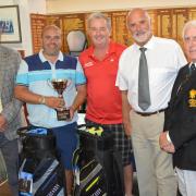 left to right; Nick Rogers Club professional. Pete Lewis and Robbie Edgson winners. Brian Craig sponsor and William McLean Club Captain.