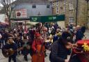 The band makes its way up Fore Street, Redruth at the weekend