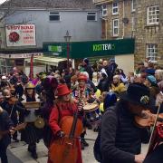 The band makes its way up Fore Street, Redruth at the weekend