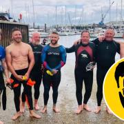 Ross Jackson-Hicks, co-founder of Man Down (L) and others in a fundraiser swim for the charity in 2019