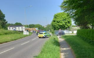 Police at the scene of the crash in Bickland Water Road