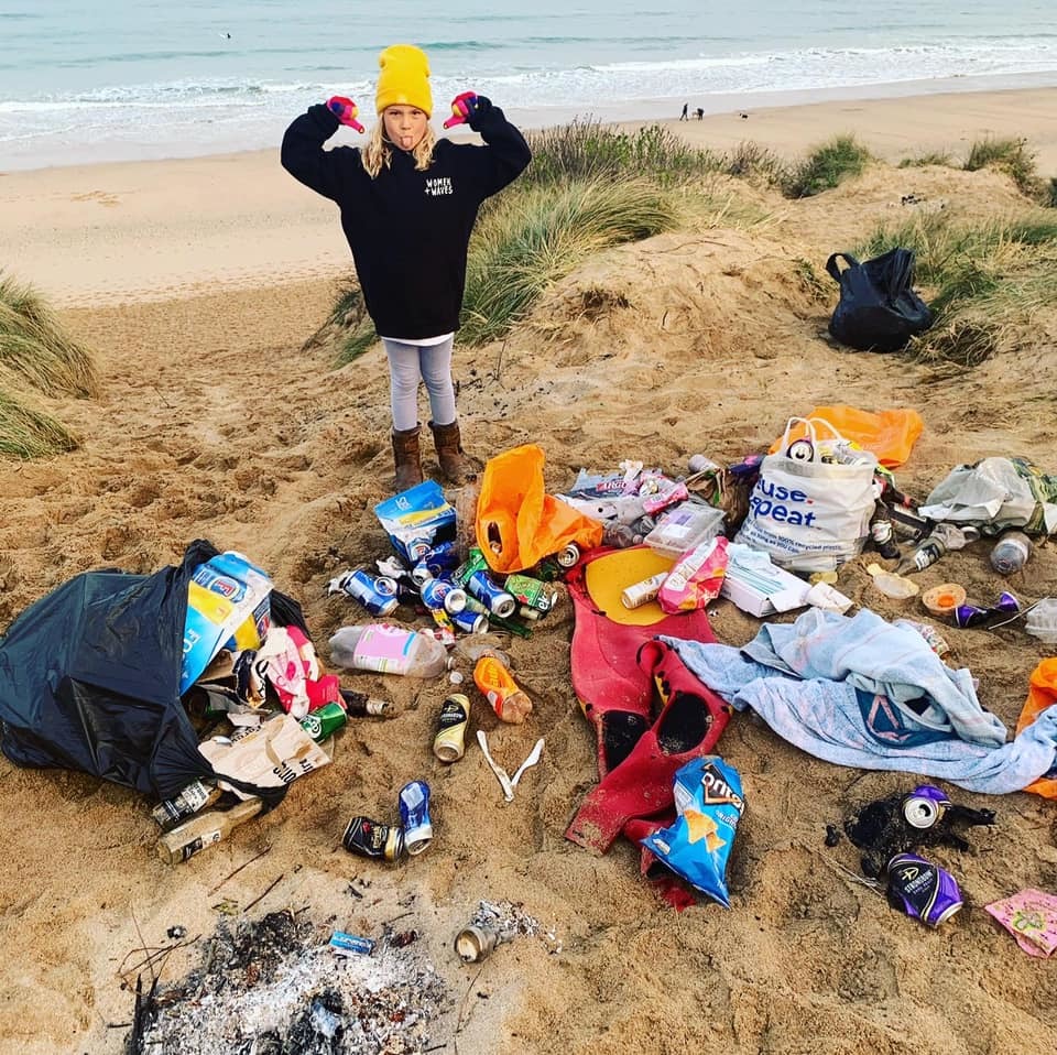 Evie collecting rubbish on Poldhu Beach. Pictures Becky Miles 