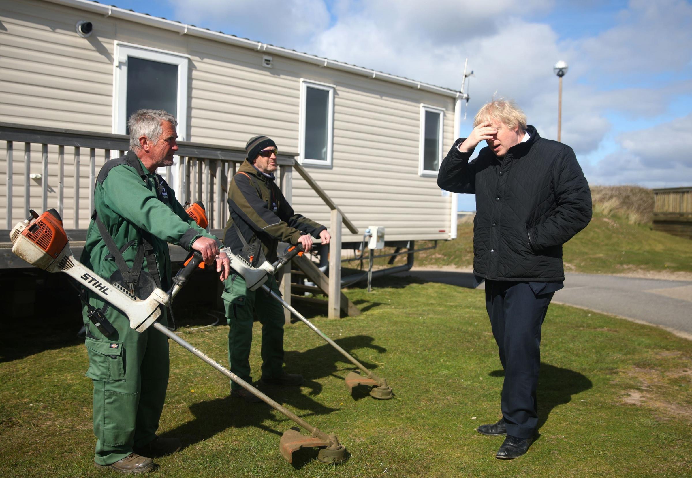 The Prime Minister speaks with staff during a visit to Haven Perran Sands Holiday Park. Picture: Tom Nicholson/PA