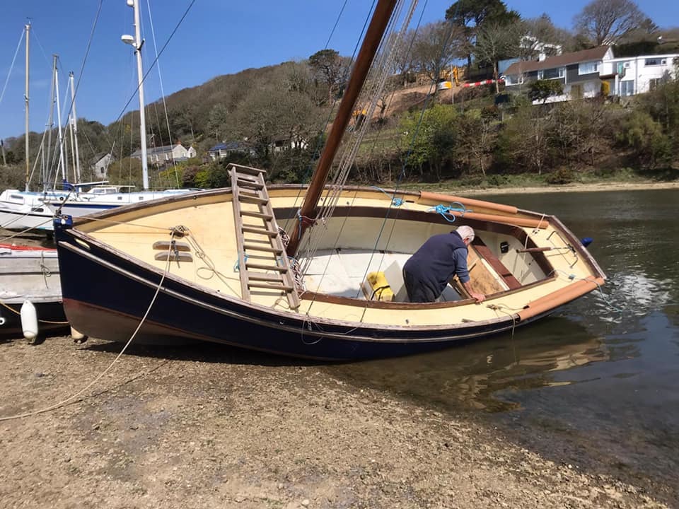Mike in his tipped boat after the supports were removed. Picture: Erin Bastian