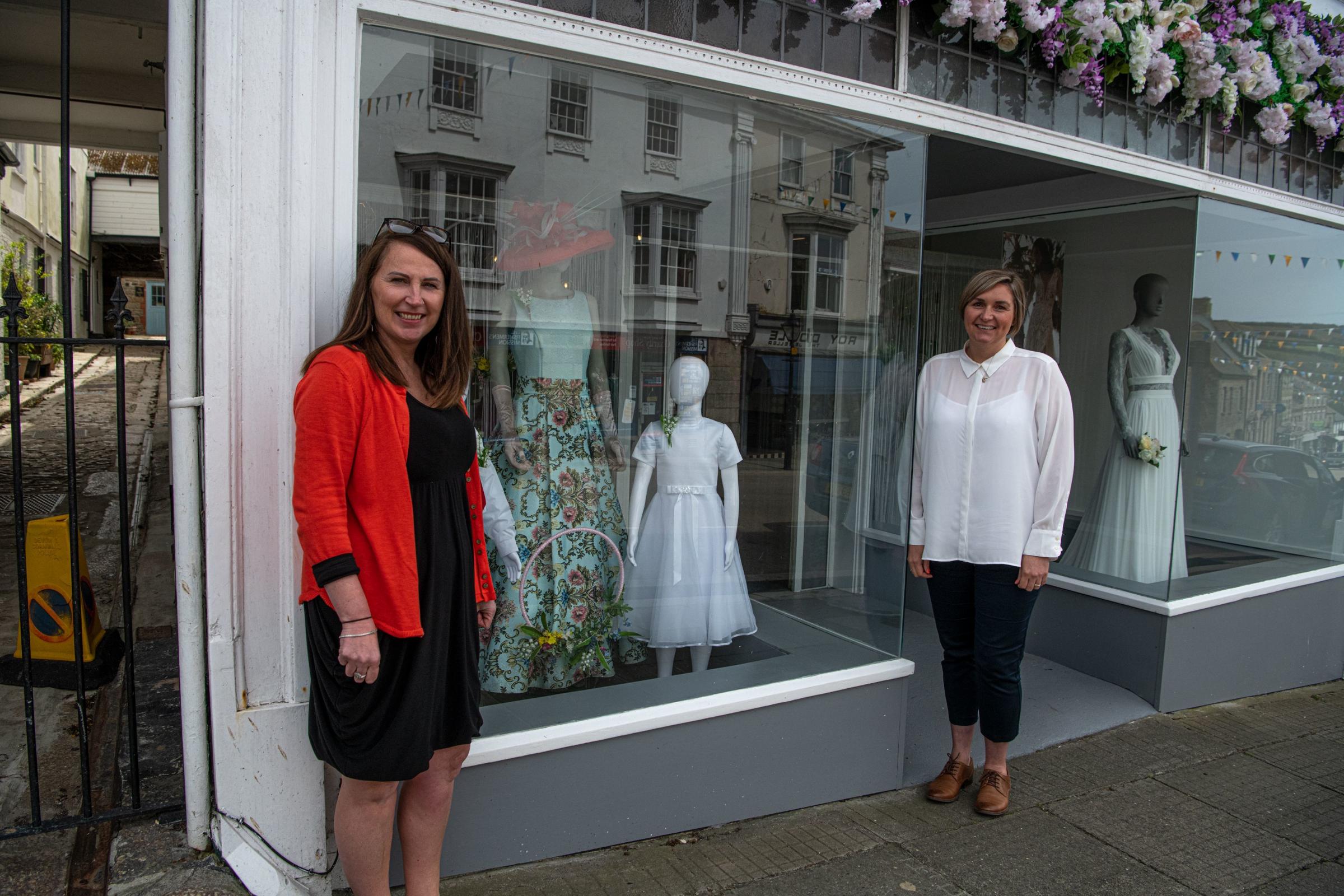 Tara Trethowan and Lucy Paul with the Bridal Studios decorated window. Picture: Kathy White