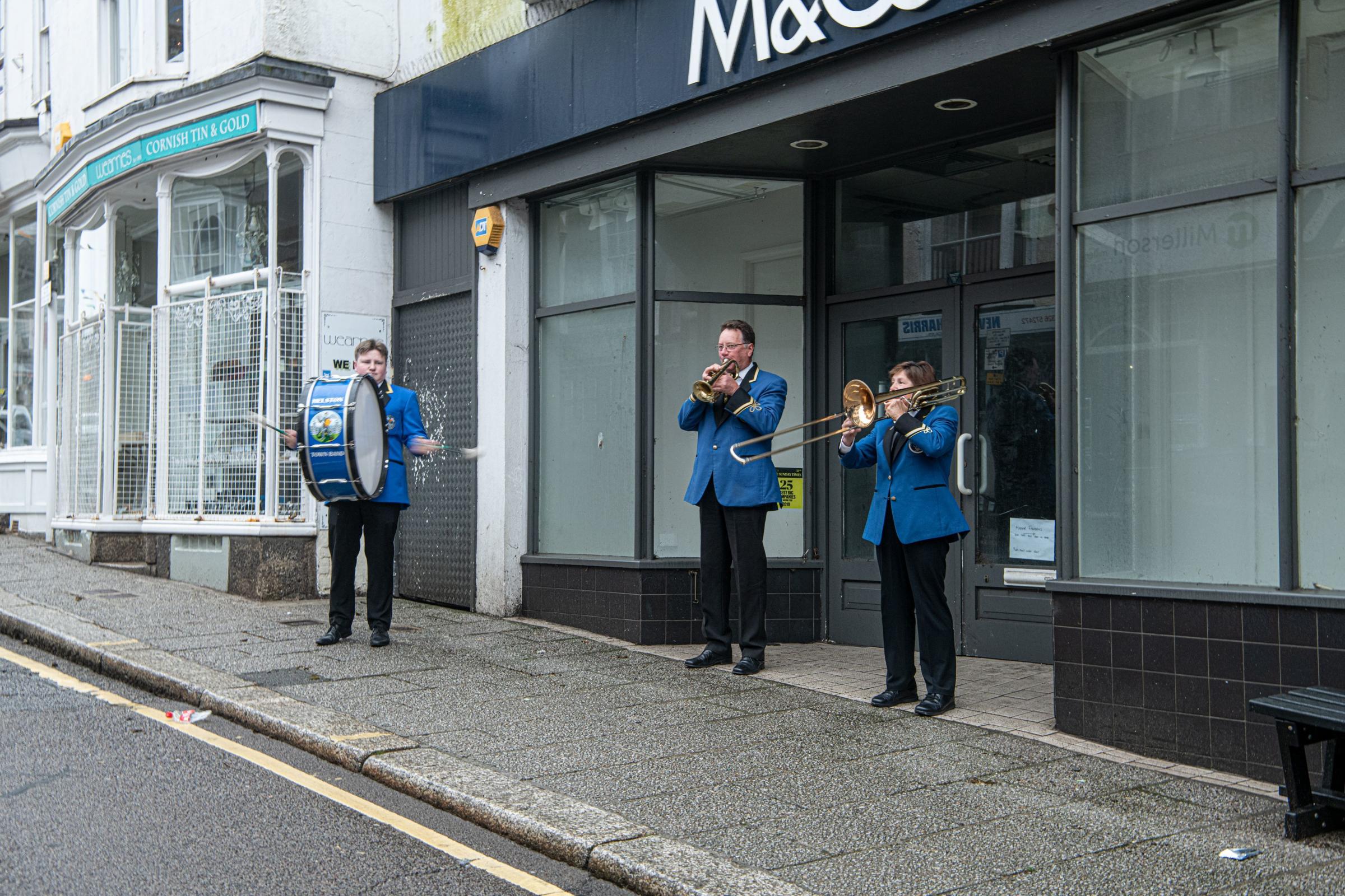 Helston Town Band members Ben, David and Ann playing at 7am. Picture: Kathy White