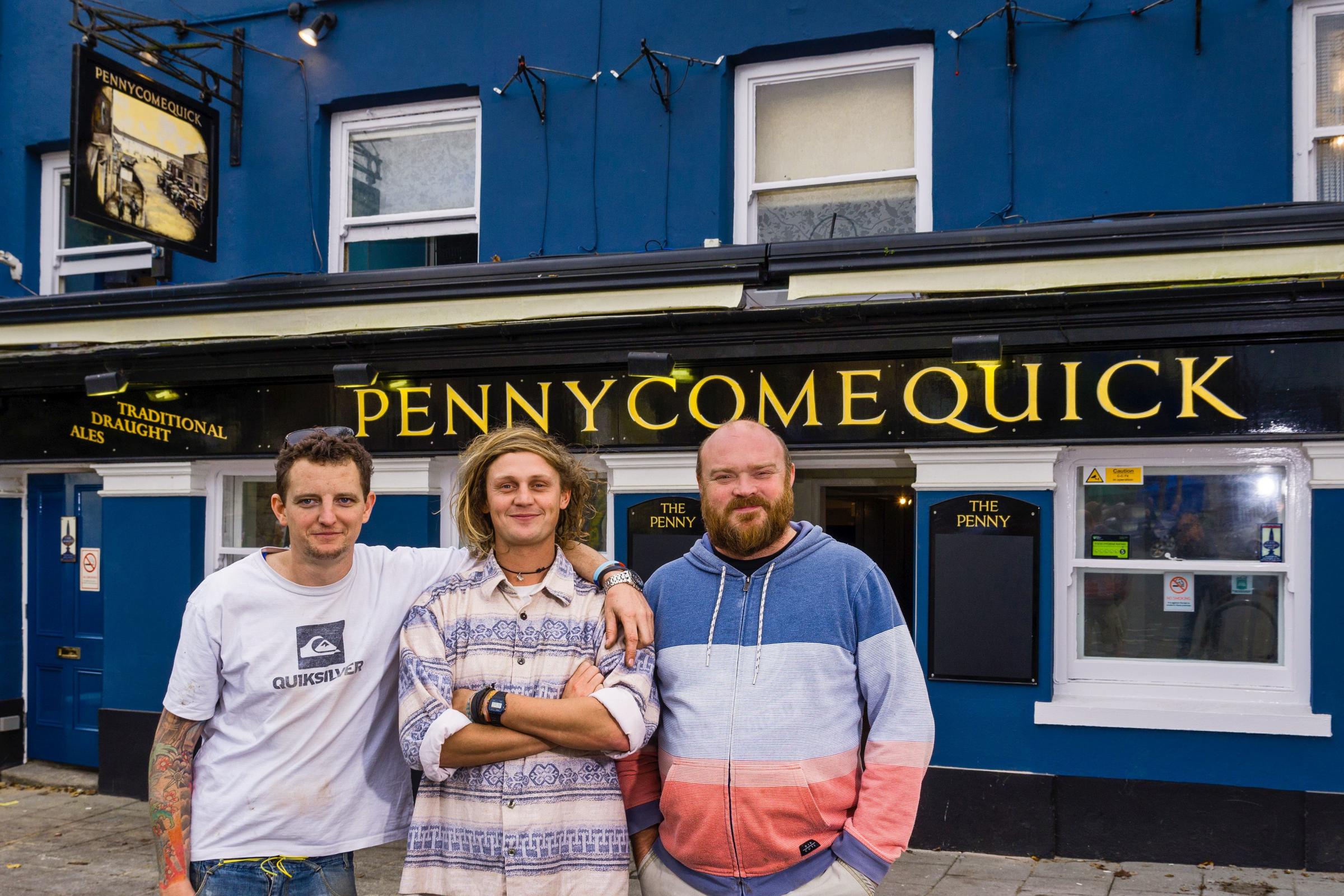 Mark White, James Luck and Steve Boot outside Pennycomequick when it opened in 2017