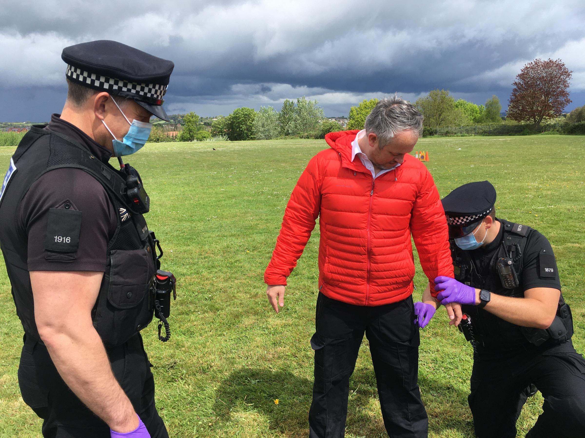 Devon and Cornwall police officers demonstrate how they would search an individual ahead of the G7 summit (Image: LDRS/Richard Whitehouse)