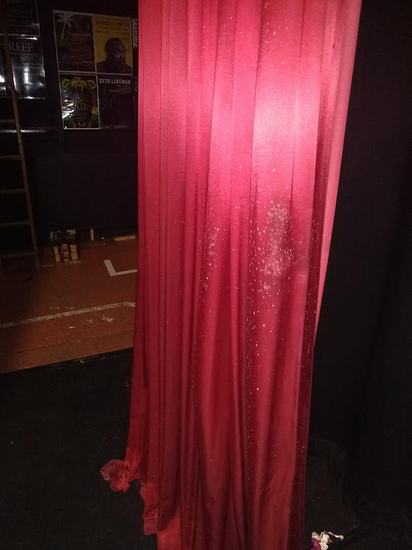 The stage curtains have gone mouldy