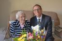 Joan Knight of Porthleven, pictured with Allister Young, CEO of Coastline Housing.