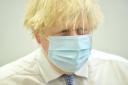 Prime Minister Boris Johnson during a visit to the Stow Health Vaccination centre in Westminster, central London. Picture date: Monday December 13, 2021. Credit: PA