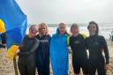 Swimmers and supporters at The Gylly Chilli Swim for Ukraine
