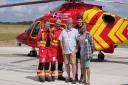 Chris Barendt (centre) with Louise Lamble and Thomas Hennessy Jones of Cornwall Air Ambulance and RNLI lifeguards Tom McRitchie and Graham Fisher
