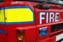 Investigation launched after fire in block of flats in town centre